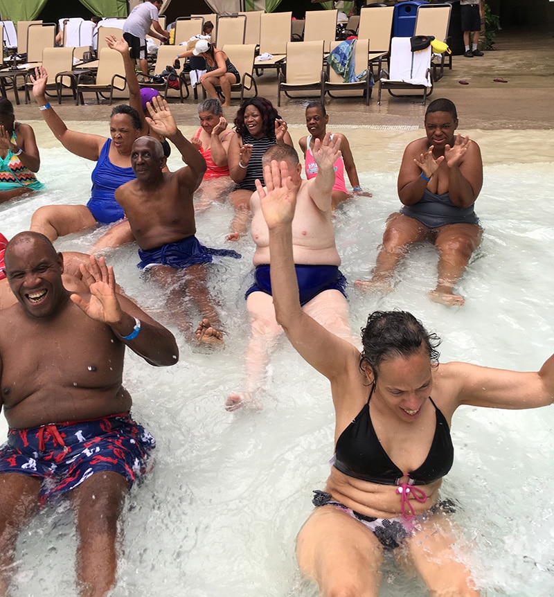 People have fun in the pool at a water park